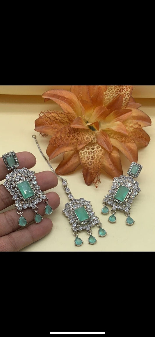 Indian tikka and earrings green and pink