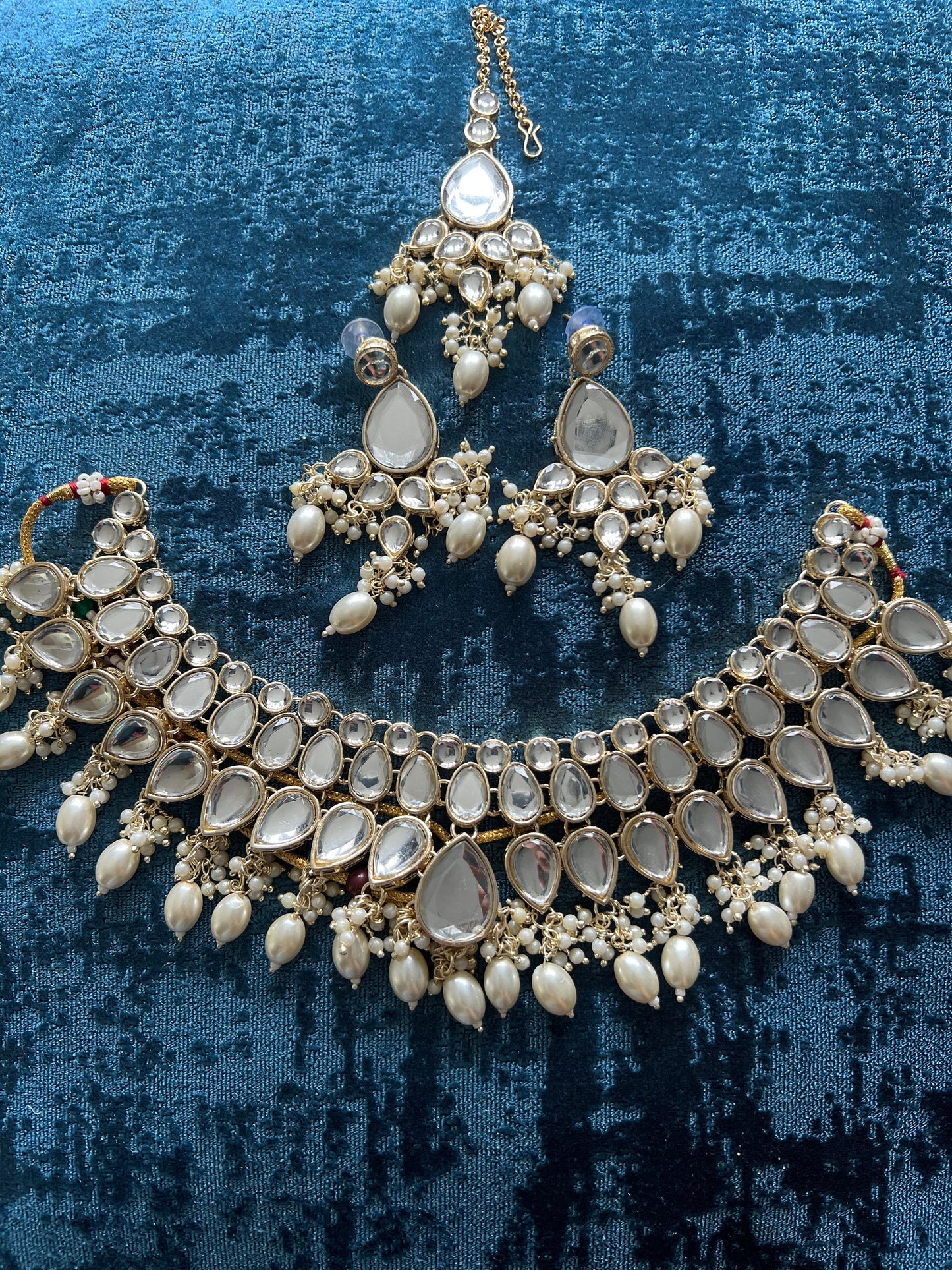 Kundan necklace earrings and tikka set